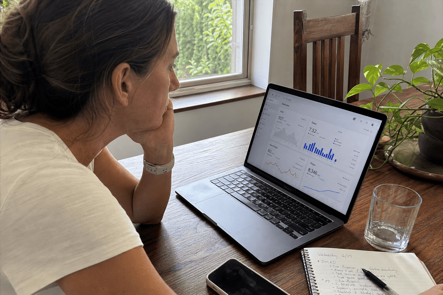 Person reviewing health data on a laptop